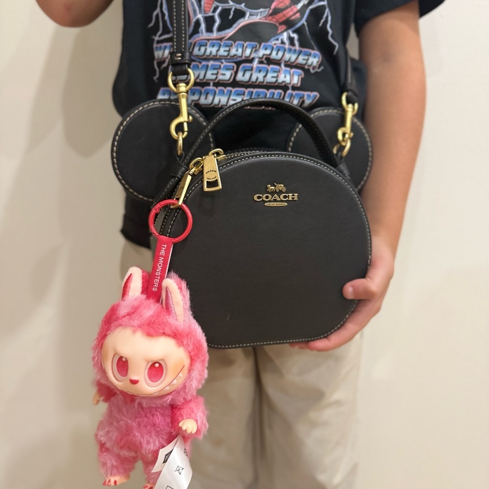 Coach Black Bag with Pink Charm